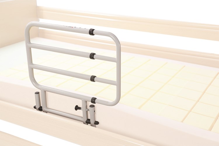 Folding bedside support rail fitted to a bed, Moretti MP167